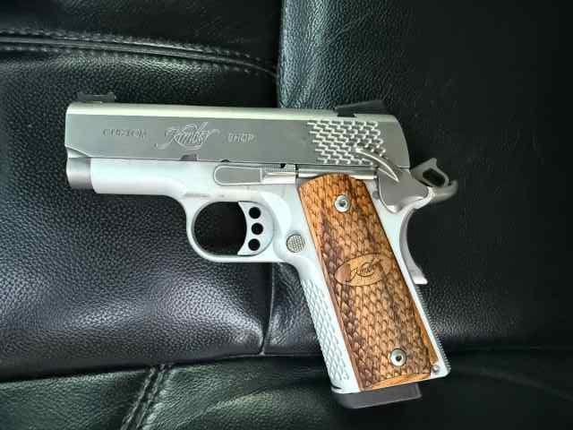 Kimber Stainless Ultra Raptor asking 1200 obo